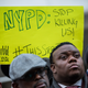 Faith leaders from communities throughout New York City lead a demonstration and prayer vigil on the steps of City Hall in protest to the Staten Island, New York grand jury’s recent decision not to indict a police officer involved in the chokehold death of Eric Garner in July on Dec. 12, 2014, in New York City.